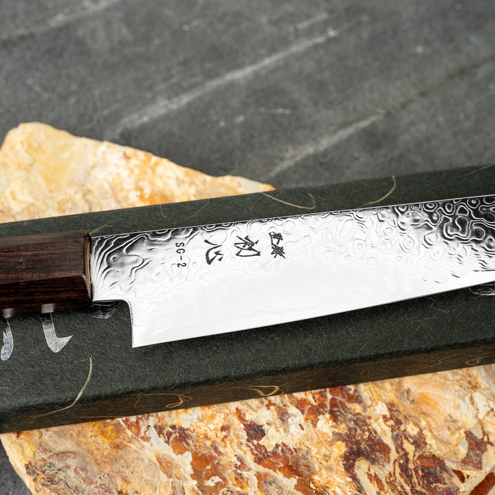 Petty 15 cm Hatsukokoro Ryuhyo Damascus SG2
