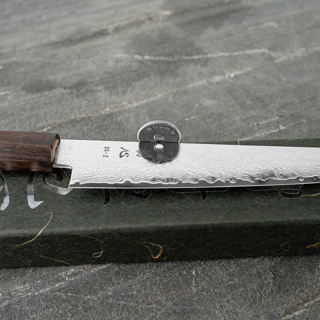Petty 15 cm Hatsukokoro Ryuhyo Damascus SG2
