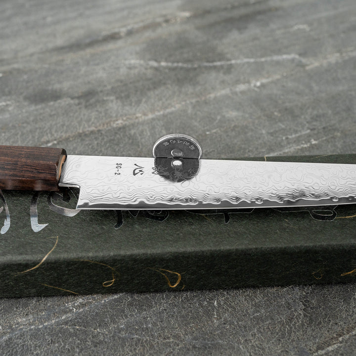 Petty 15 cm Hatsukokoro Ryuhyo Damascus SG2