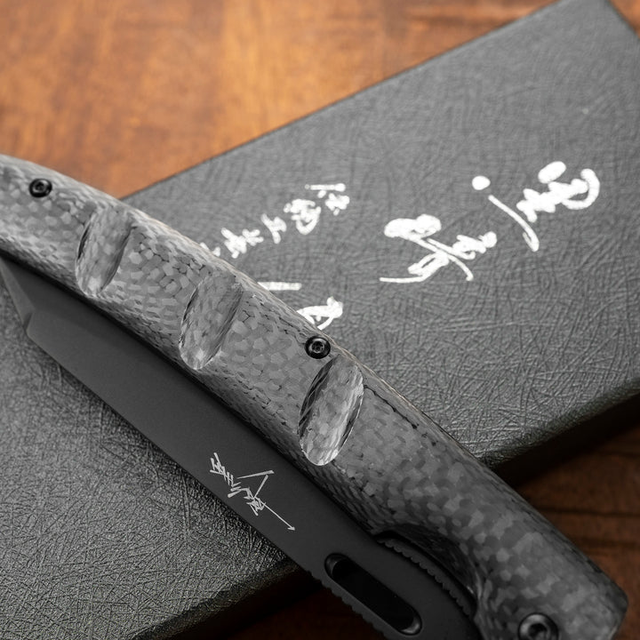 Folding knife 10,5 cm Yu Kurosaki Carbon SG2