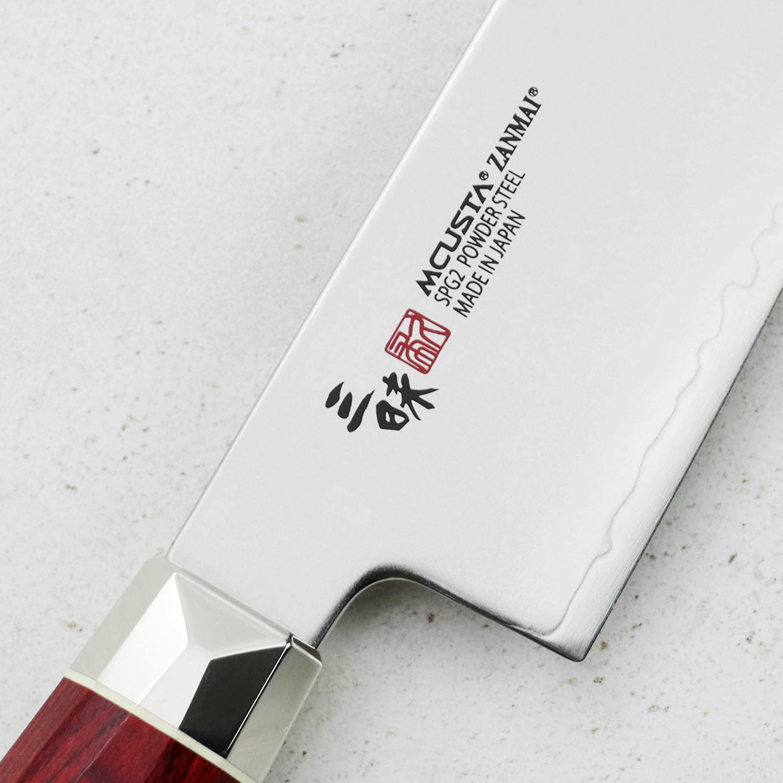 Santoku 15 cm Mcusta Zanmai Red Revolution SG2 – Japan-knives.com