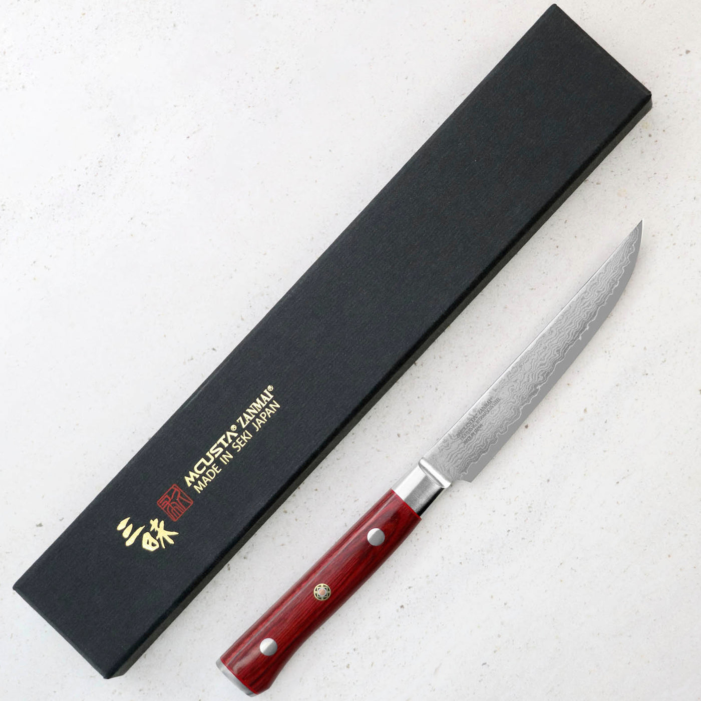 https://japan-knives.com/cdn/shop/products/steak-knife-115-cm-mcusta-zanmai-classic-pro-flame-vg-104_1400x.jpg?v=1663795163